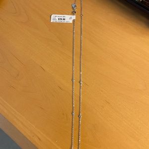 CZ red gem necklace. Silver chain.